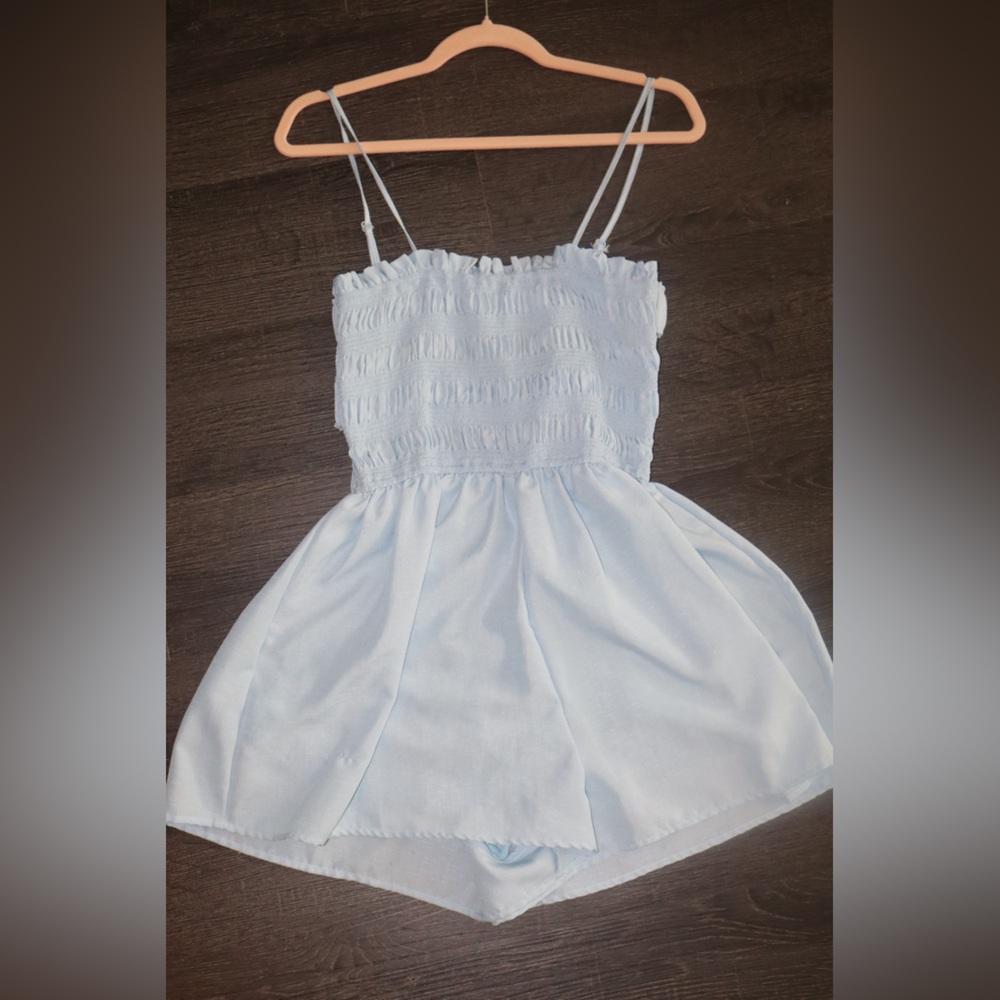 Light Blue Back Detailing Romper with pockets Size: Small